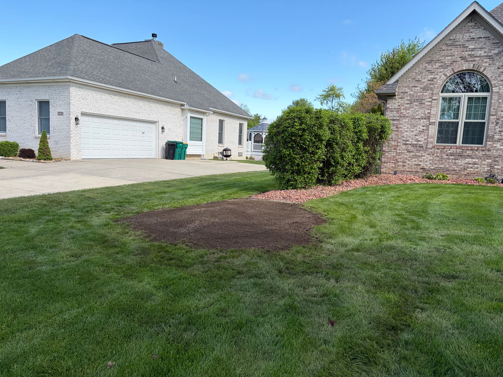 Rock Bed and Bush Removal with Fresh Topsoil and Seed in New Boston
