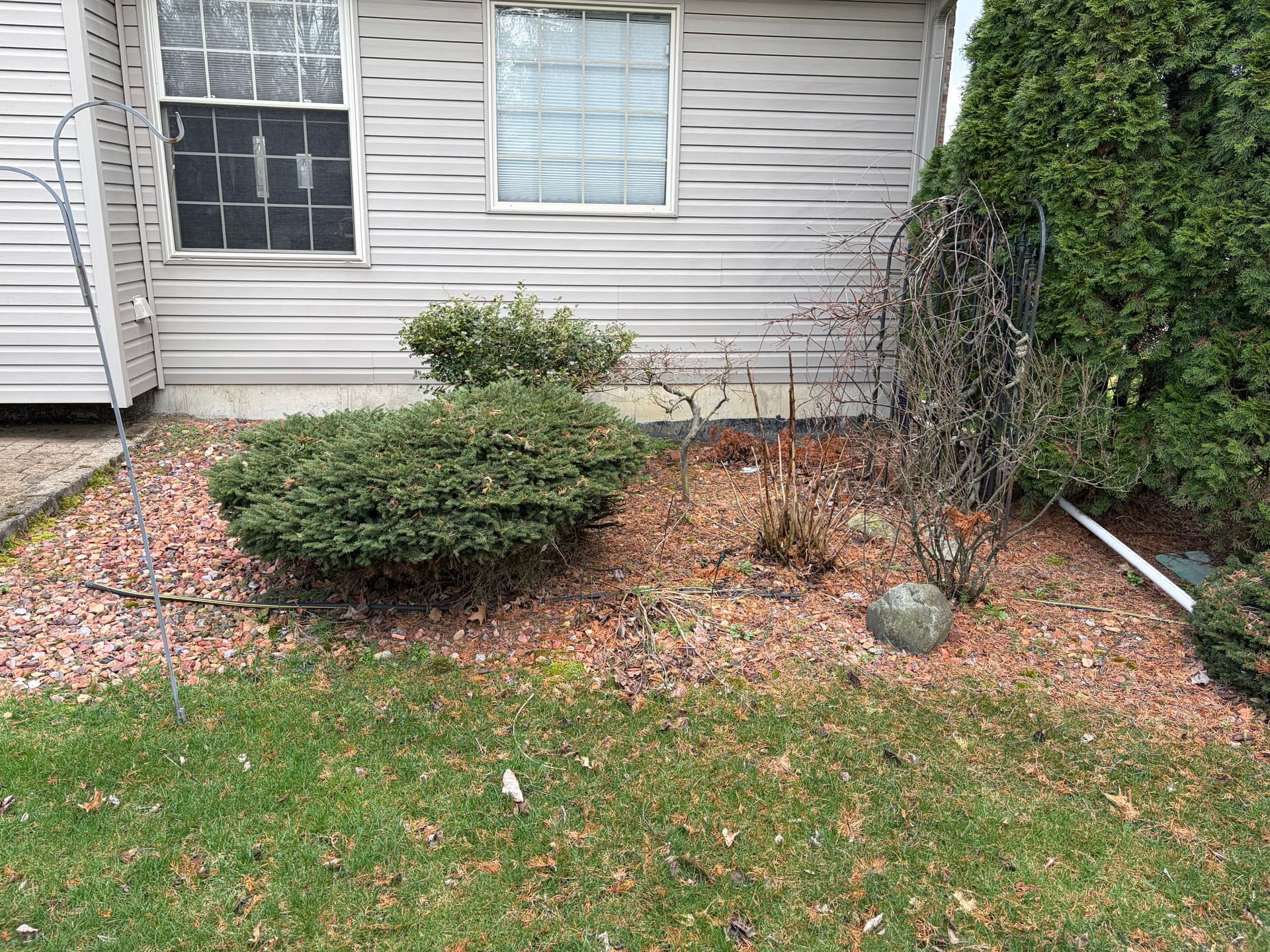 Rock Bed and Bush Removal with Fresh Topsoil and Seed in New Boston