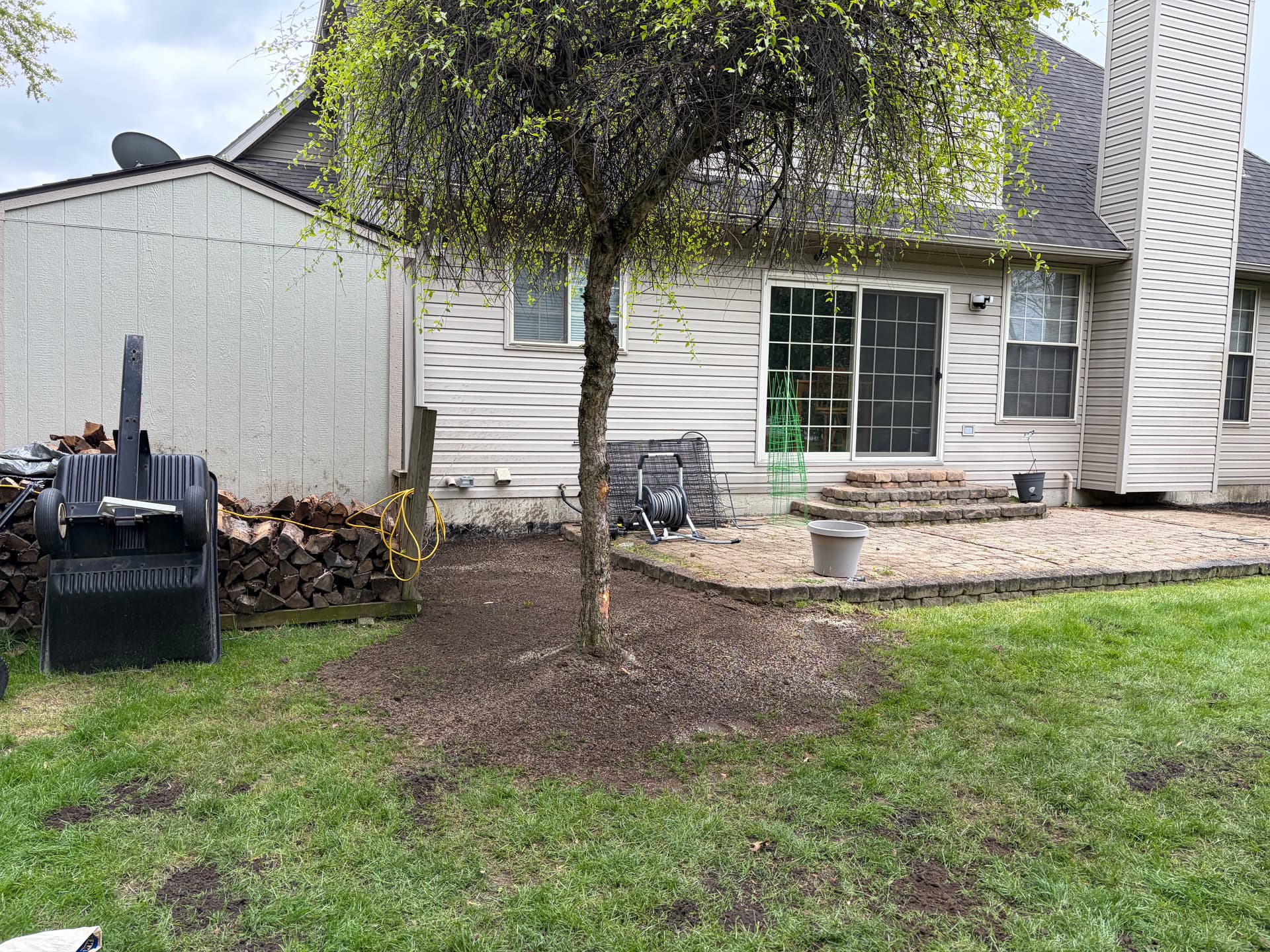Rock Bed and Bush Removal with Fresh Topsoil and Seed in New Boston
