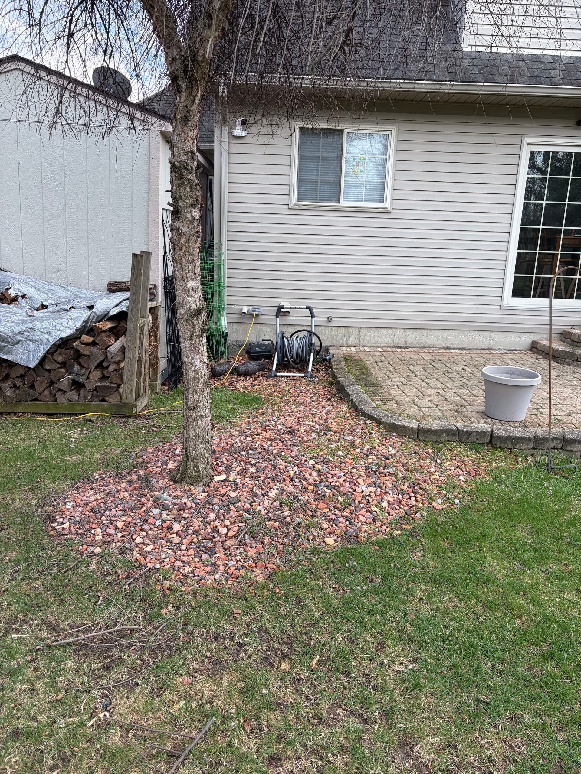 Rock Bed and Bush Removal with Fresh Topsoil and Seed in New Boston