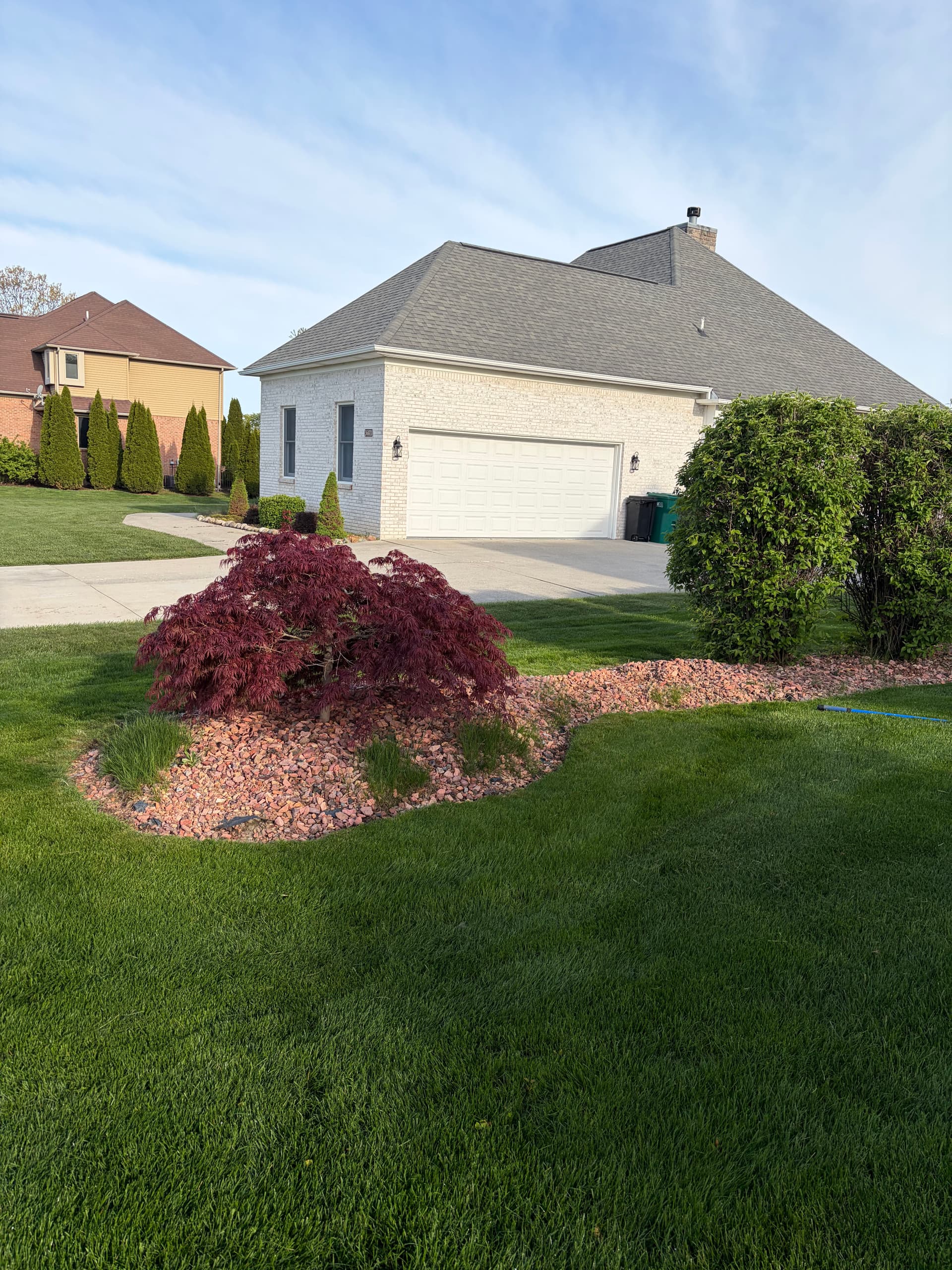 Rock Bed and Bush Removal with Fresh Topsoil and Seed in New Boston