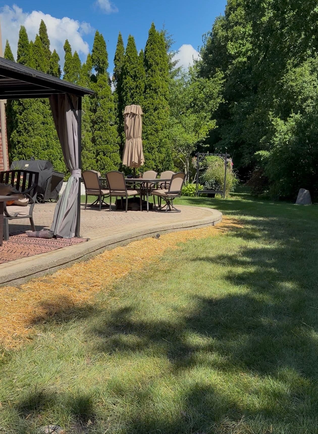 Paver Patio Rebuild with Proper Edging Wall and Limestone Base image